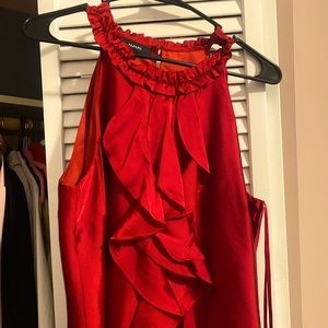 Red sleeveless blouse